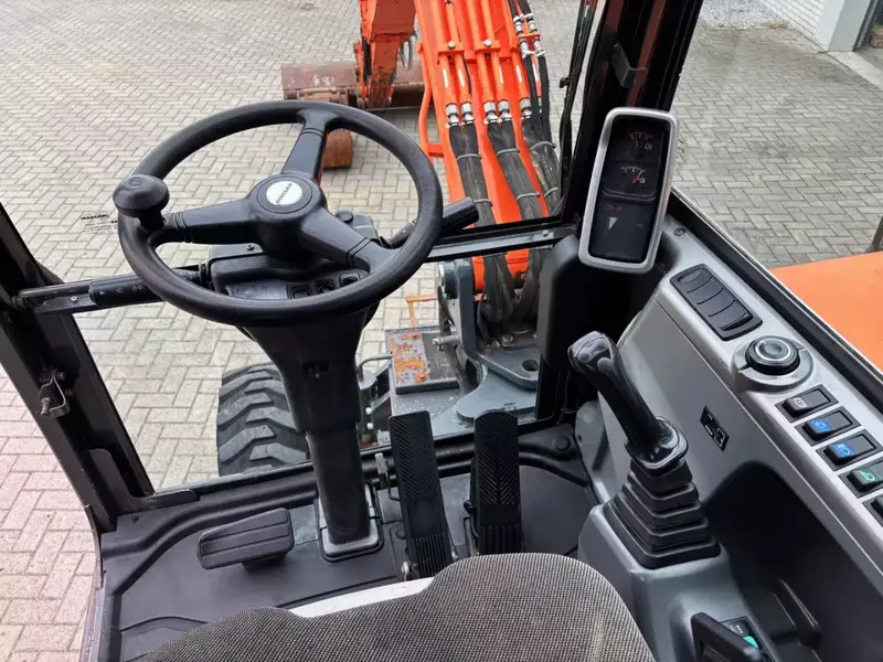  Колесный экскаватор Doosan DX55WK с кондиционером. - Ekskovatorlar