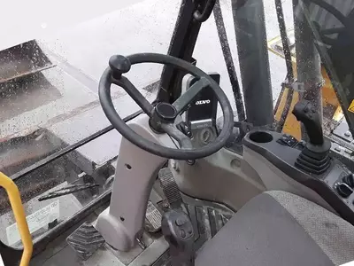Колесный экскаватор Volvo EW 140