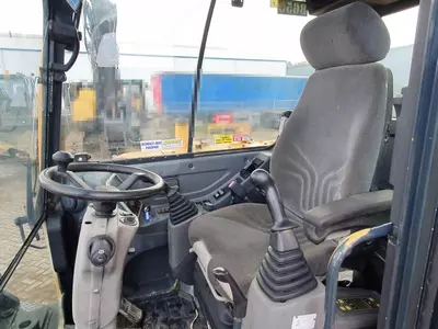 Колесный экскаватор Hyundai R55W-9