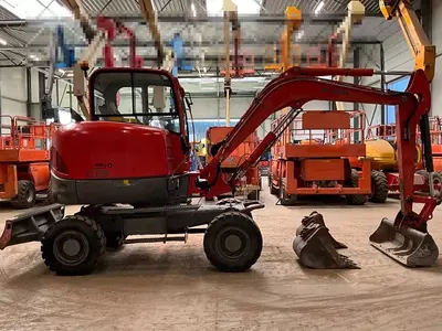   Колесный экскаватор WACKER NEUSON 6503 WD