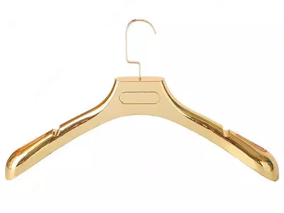 золотая пластиковая вешалка