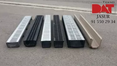 Пластиковая система водоотвода (лотки ,дождеприёмники )