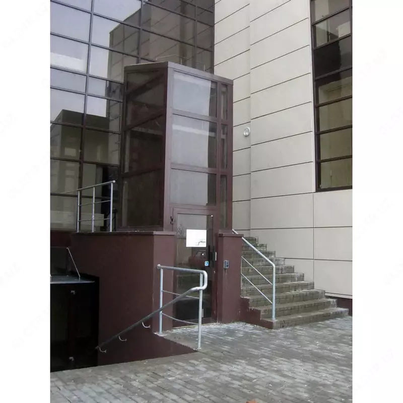 Вертикальный подъёмник для инвалидов в шахте (Шахтный инвалидный подъёмник)