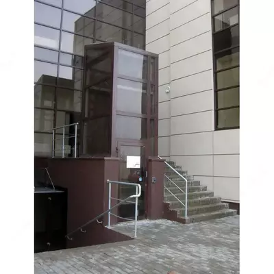 Вертикальный подъёмник для инвалидов в шахте (Шахтный инвалидный подъёмник)