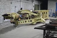 Разгрузчик вагонов с мешками