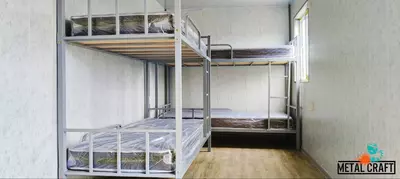 Металлическая двухъярусная кровать "Metalcraft" 2000х1650х900 мм