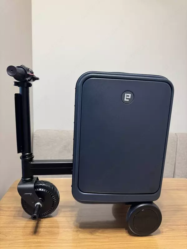   Электрический чемодан-самокат — надёжный  складной  стильный.