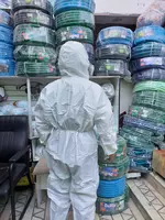   Защитный комбинезон с капюшоном одноразовые и многоразовые Оптом за шт