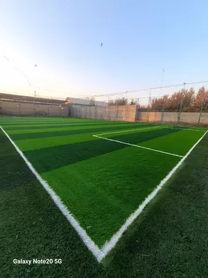   Suniy gazon— futbol maydonlari va bolalar maydoni
